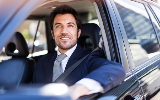 business-suit-driving-car-travel
