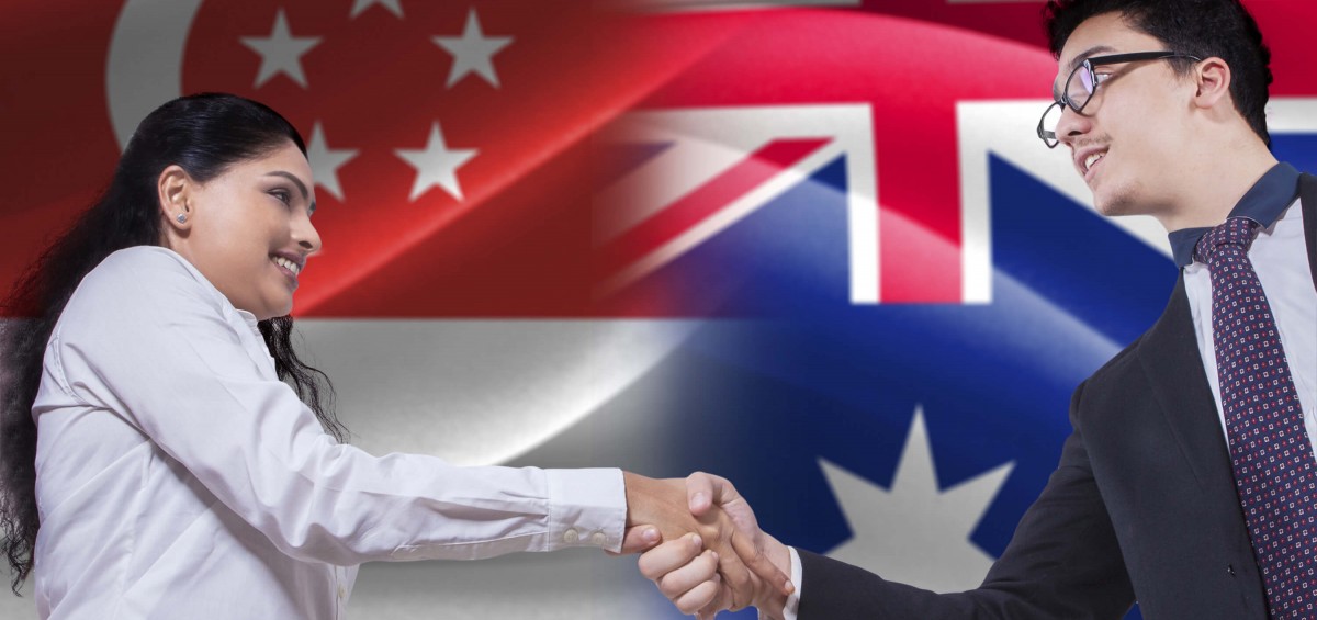 singapore-australia-shake-hands-employees